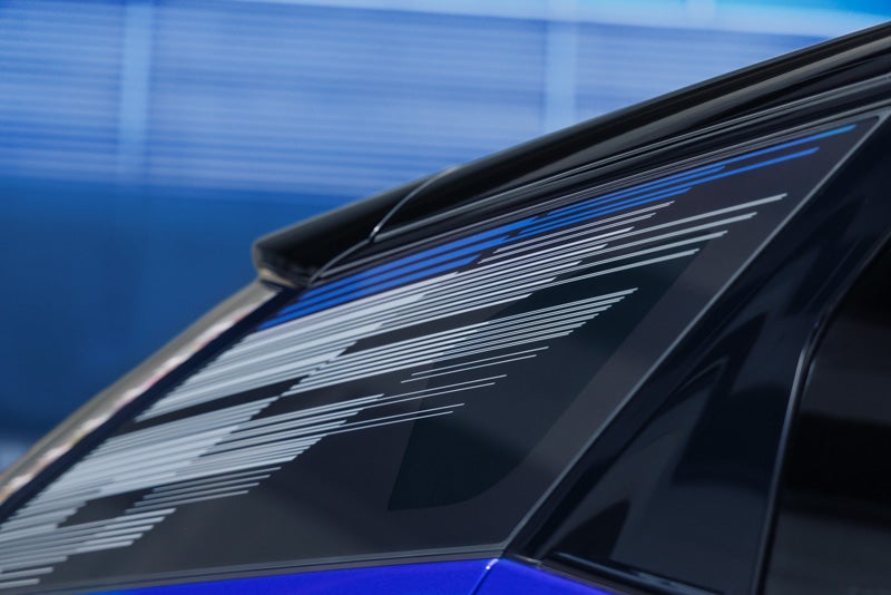 Close-up of the Modern Pattern on the 2026 OPTIQ-V Rear Quarter Glass | Cadillac of Memphis in Memphis TN